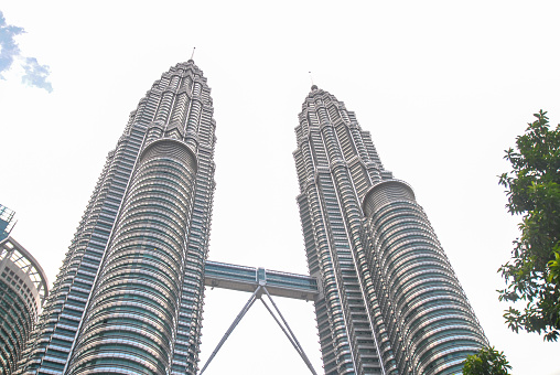 Focus on Petronas Twin Towers (Kuala Lumpur City Centre Twin Towers) in Malaysia