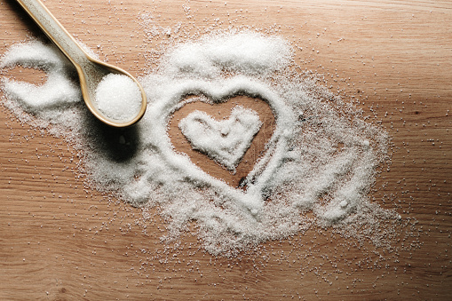 A heart drawn on sugar grains
