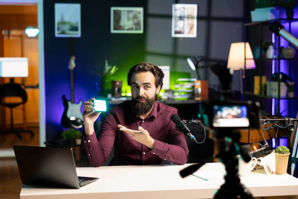 istock Influencer endorsing mini led lights from sponsor during live broadcast 2043217124