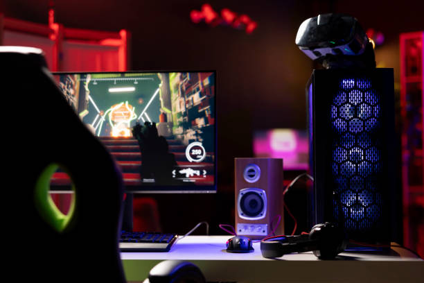 istock Professional gaming empty room studio with PC, headphones and VR headset 2043243836