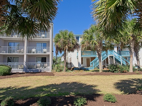 Myrtle Beach, South Carolina - USA, February 21, 2024. Comparing revived apartment to condemned building along Myrtle Beach South Carolina.