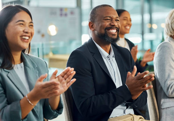 istock Business people, diversity and applause or audience presentation at workshop for welcome, conference or coaching. Colleagues, clapping and corporate meeting in London for proposal, support or event 2043255025