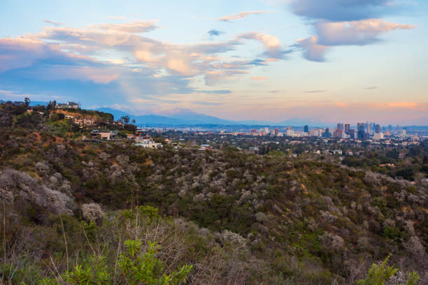 Looking out towards downtown Los Angeles and the snow covered San Gabriel Mountains. Pictures taken during sunset in the Santa Monica Mountains.