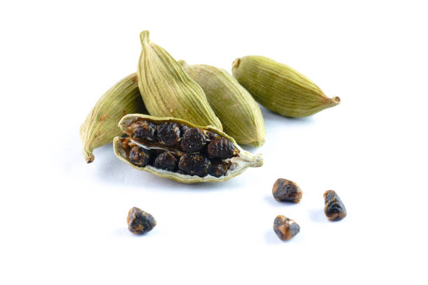 istock Cardamom pods and seeds concept background 2043280503