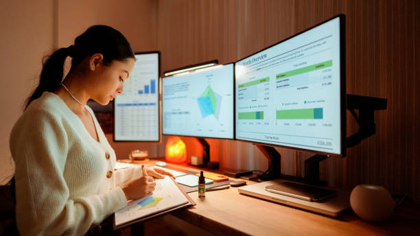 istock Stressed woman working late is using CBD oil for peace of mind 2043283647