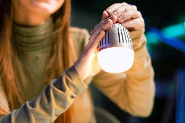 istock Content creator showcasing smart home automation technology in apartment studio 2043294472