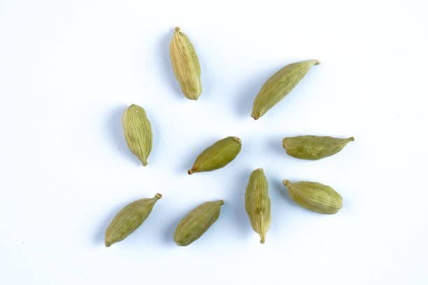 istock Green cardamom pods concept background 2043305028