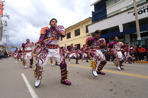 Huancayo, Peru: Photo of a men group of folkloric dancers dancing 