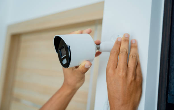 istock A technician installs a CCTV camera in a modern apartment. 2043332777