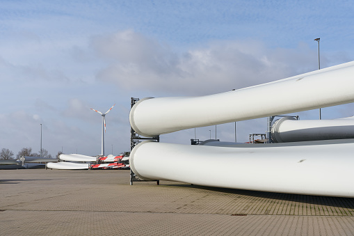 Storage area for wind turbine rotor blades in an industrial area in Germany