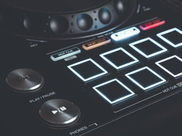 Close up studio image of a DJ mixing desk.