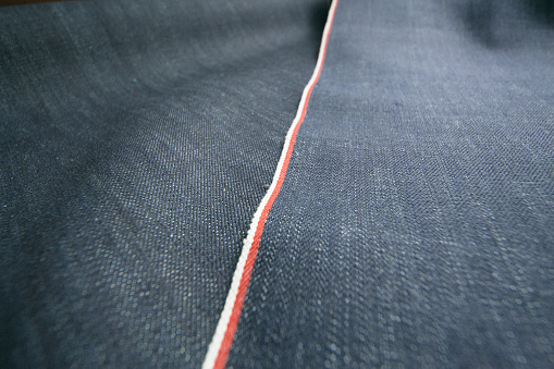 Close-up of texture fabric cloth textile background with selective focus.