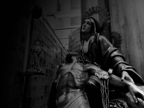 Sculpture of the Pietà, Jesus dead in his mother's arms Image of Piety, Jesus dead in the arms of his mother, Religious image in a columbarium of the San José Church in Medellín Antioquia pieta stock pictures, royalty-free photos & images