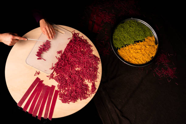 Preparation of dough-based dishes found in Turkish cuisine. making noodles. Making ravioli, noodles and stuffed meatballs It was shot in the studio with a full frame camera.