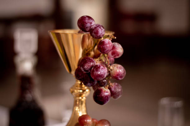 istock Close-up chalice and grapes, elements of the last supper 2043487907