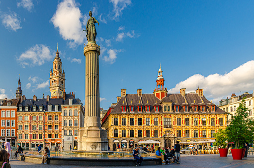 Lille, France, July 3, 2023: La Grand Place square in city center, monument Flemish mannerist architecture style buildings, Column of the Goddess, Vieille Bourse, French Flanders, Nord department