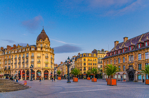 Lille, France, July 3, 2023: Place du Theatre square in Lille city historical center with Hotel Carlton, Old Stock Exchange, French Flanders, Nord department, Hauts-de-France Region