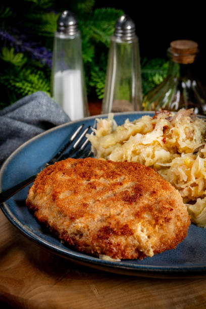 istock Minced meat cutlet with boiled sauerkraut. 2043603301