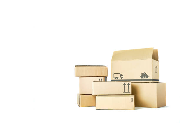 istock pile of brown packaging cardboard boxes stacked on white background 2043649406