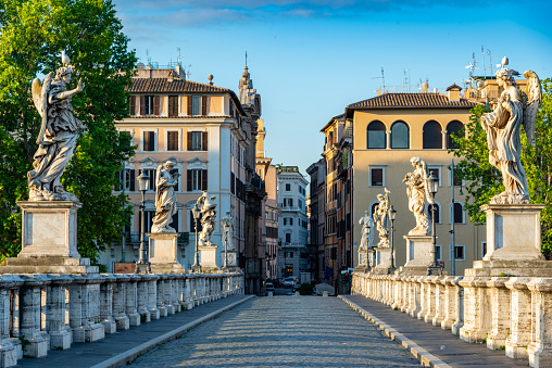 Early morning Sant Angelo Bridge over the Tiber River completed in 134 AD by the Emperor Hadrian. Rome, Italy.