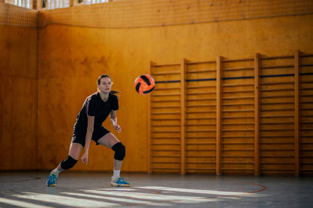 istock A sportswoman in action playing volleyball on training. 2043687735
