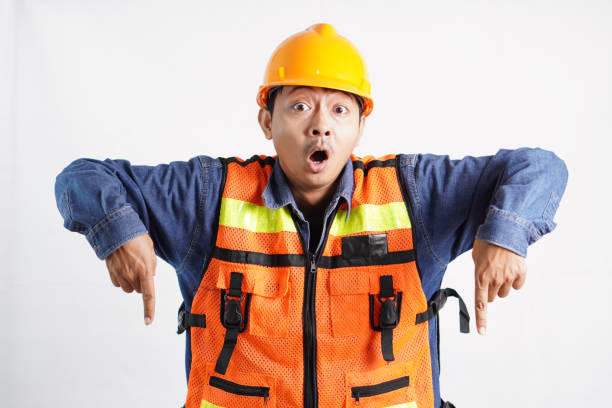 istock Asian engineer handsome man or architect looking forward with white safety helmet. prepare modern building construction. Worker asian man pointing down 2043689304
