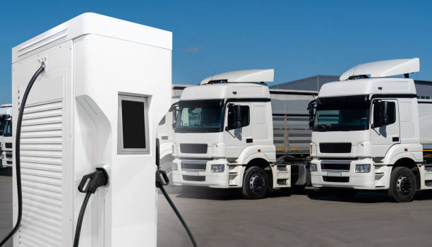 istock Electric trucks with charging station. Concept 2043693979