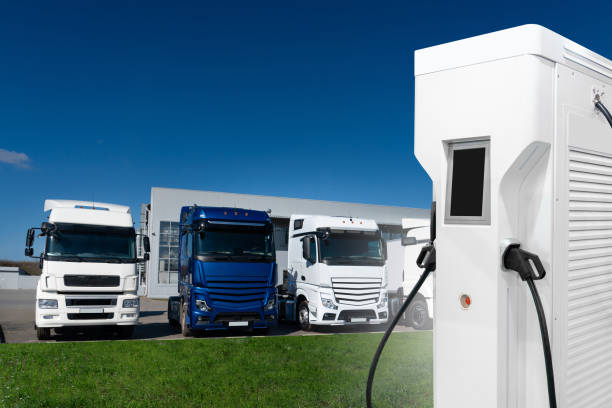 istock Electric trucks with charging station. Concept 2043694075