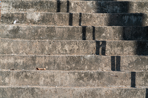 Close up cement gray granite steps stairs the floor in the city old staircase detail abstract stone staircase background