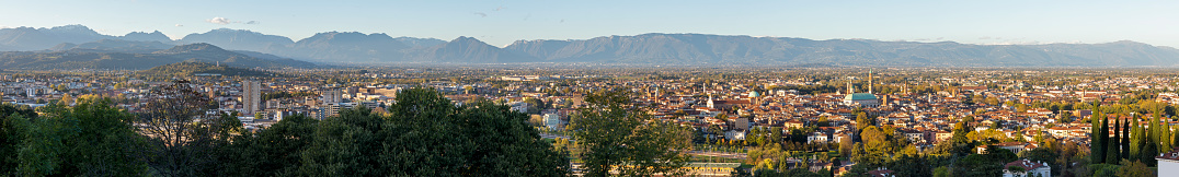 Panorama of Vicenza in evening light wiht Alps in the background.