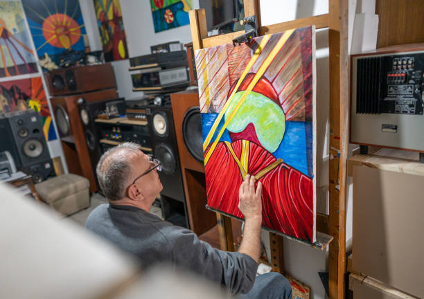 istock Senior man painting 2043708351