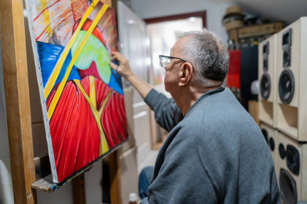 istock Senior man painting 2043712598