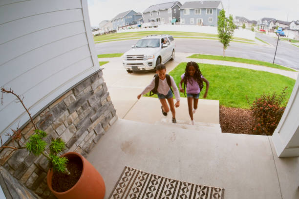 istock Home Security Camera Footage of Children Coming and Going 2043716423