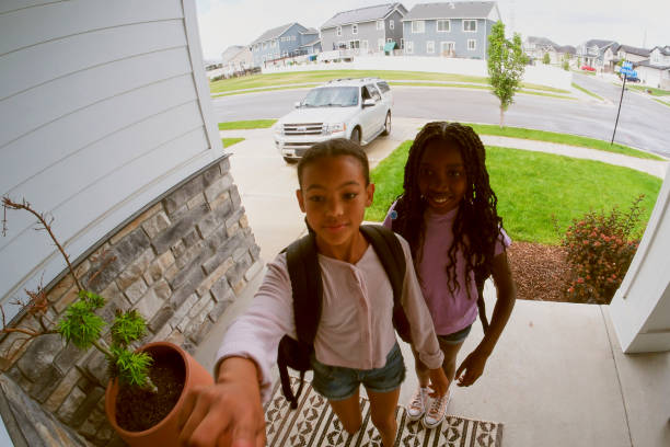 istock Home Security Camera Footage of Children Coming and Going 2043716935