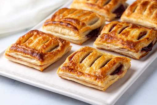 Miniature Danish Pastries with cherry,  close up