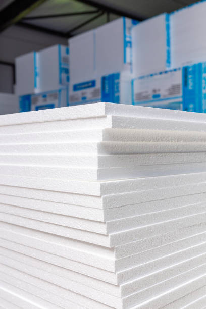 A large blocks of Styrofoam are stacked in a warehouse. stock photo
