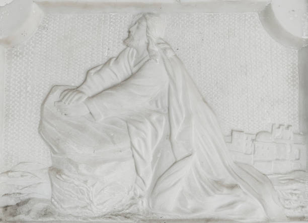 Detail of carving on a marble plaque of Jesus praying in the olive garden, image belonging to a tombstone in the Carmen cemetery in Viboral Antioquia