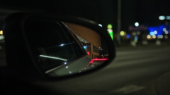 Busy Evening City Street Traffic Car Mirror Reflection