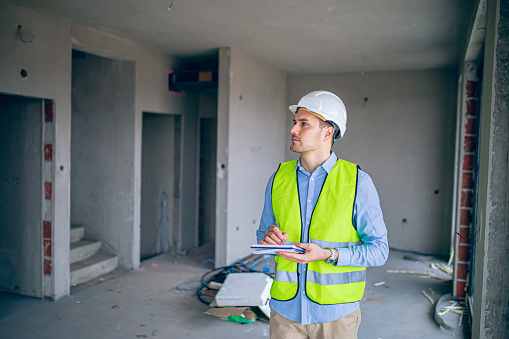 Male architect on construction site