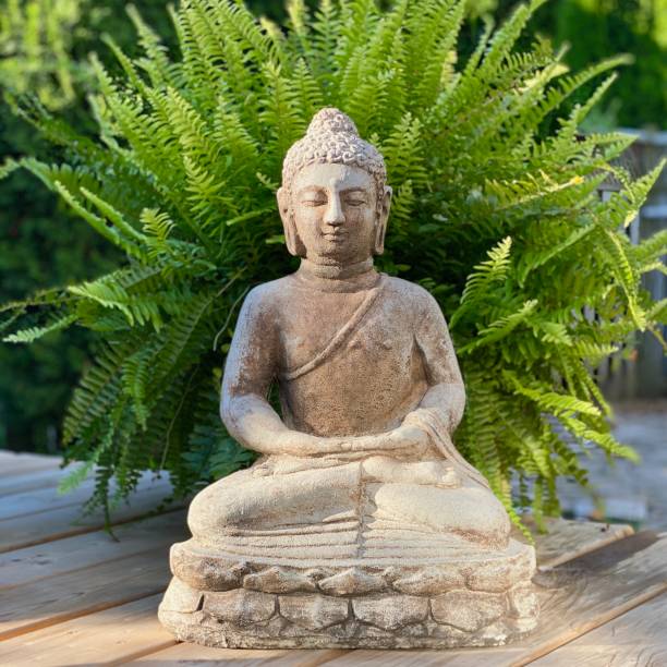 istock buddhist statue outdoors 2043857174