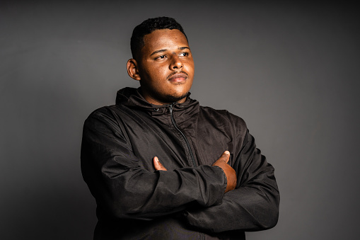 Portrait of a young man worker in studio