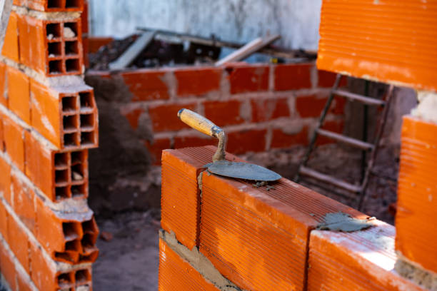 Construction of a brick wall in process - Construction industry concepts - No people