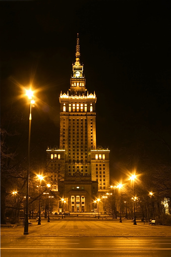 Palace of Culture and Science (Polish: Palac Kultury i Nauki) at night, Warsaw city downtown, Poland. Palace of culture was a gift from Stalin to Polish people in 50's.