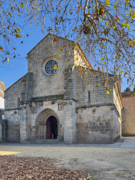 facade of the vila real se cathedral at autumn, also known as the church of sao domingos, north of portugal - medieval autumn cathedral vertical imagens e fotografias de stock