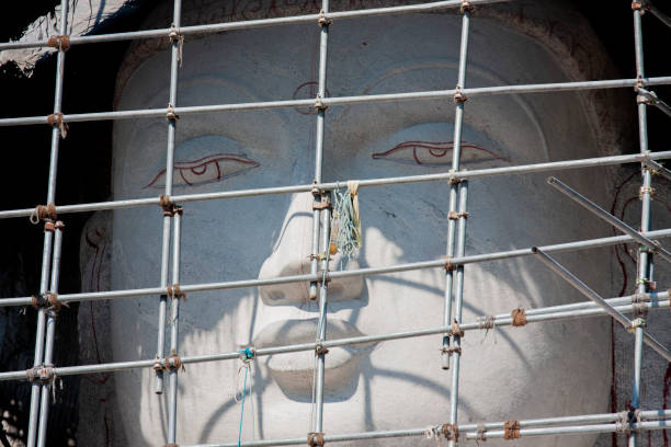 Large Stone Buddha Statue under construction in Monaragala Temple, Kurunegala, North Western Province, Sri Lanka