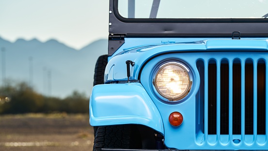 Passenger side headlight of a truck