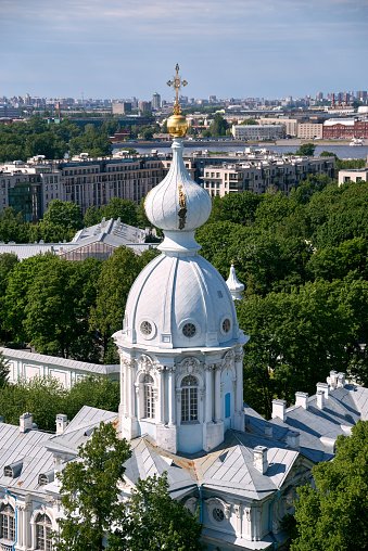 Panoramic top view of Saint Petersburg and part of the architectural ensemble of the Smolny Monastery from bell loft observation deck of Smolny cathedral. Saint Petersburg. Russia.