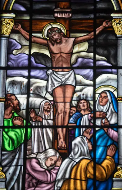 Stained glass representation of the XII Station of the Via Crucis Jesus dies on the Cross. Stained glass in a church in eastern Antioquia
