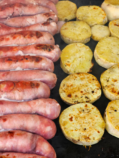 Sausages and sweet potatoes almost ready