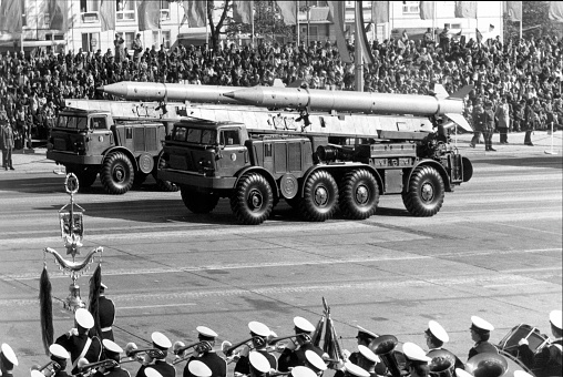 Military parade for the 30th anniversary of the German Democratic Republic on Karl-Marx-Allee in East Berlin - GDR.